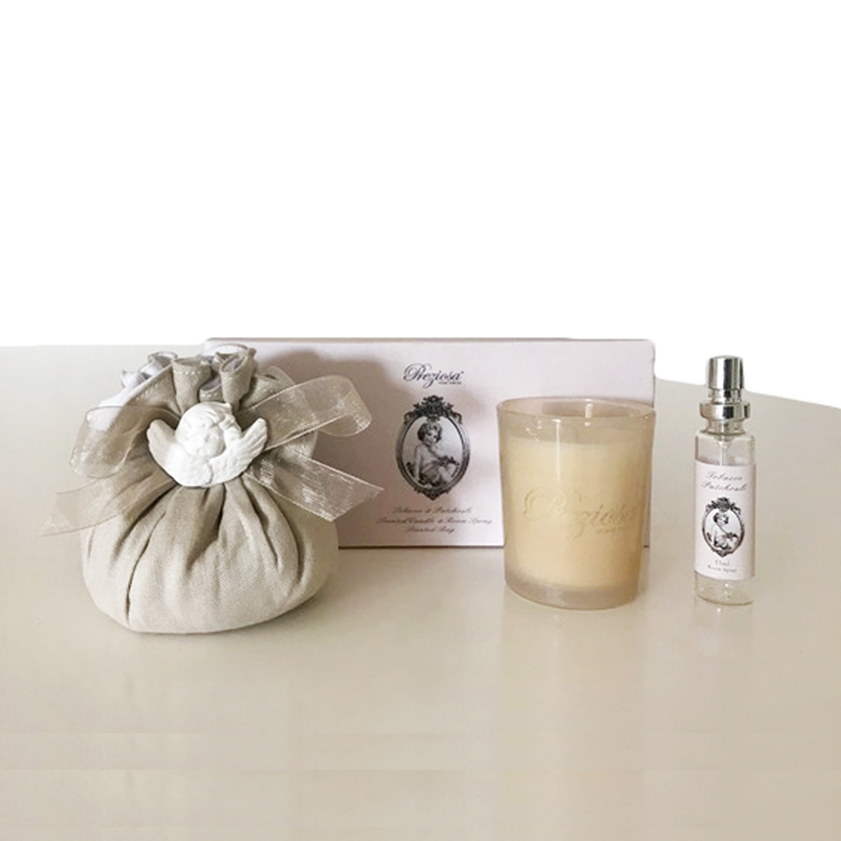 Sacchetto+candela + spray 15ml Tabacco e Patchouli
