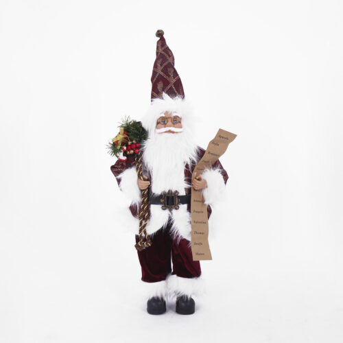 Babbo Natale in piedi su sci con sacco portadoni
